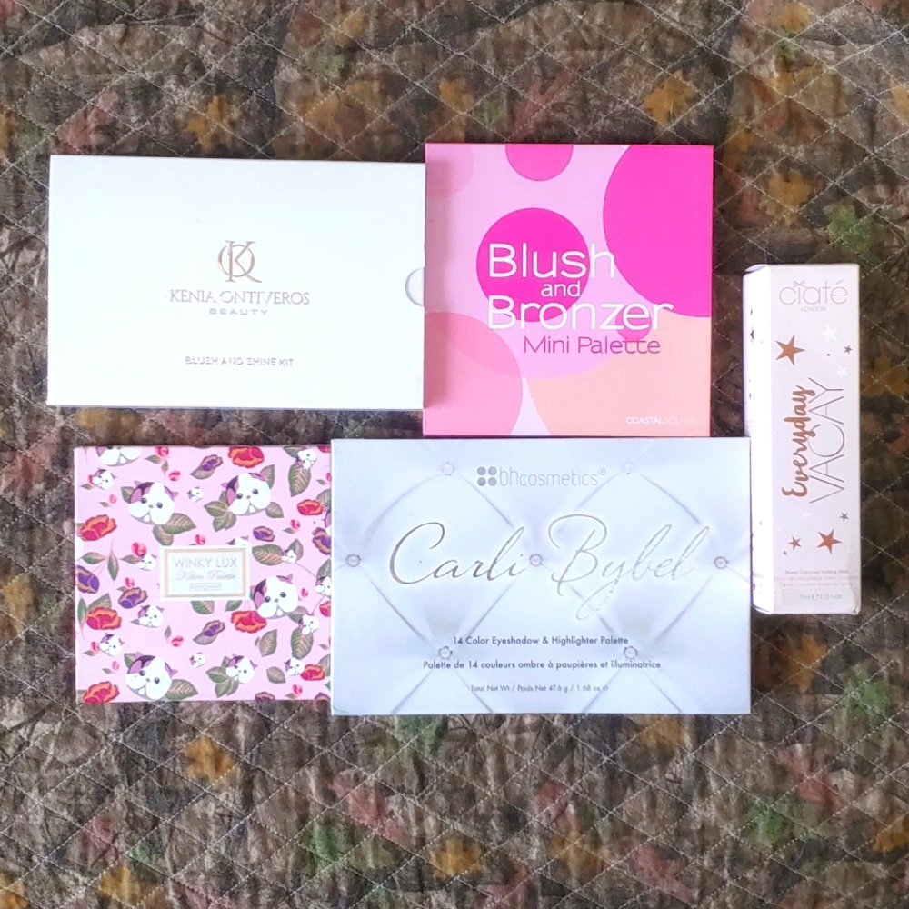 Lot of Makeup palettes and setting spray